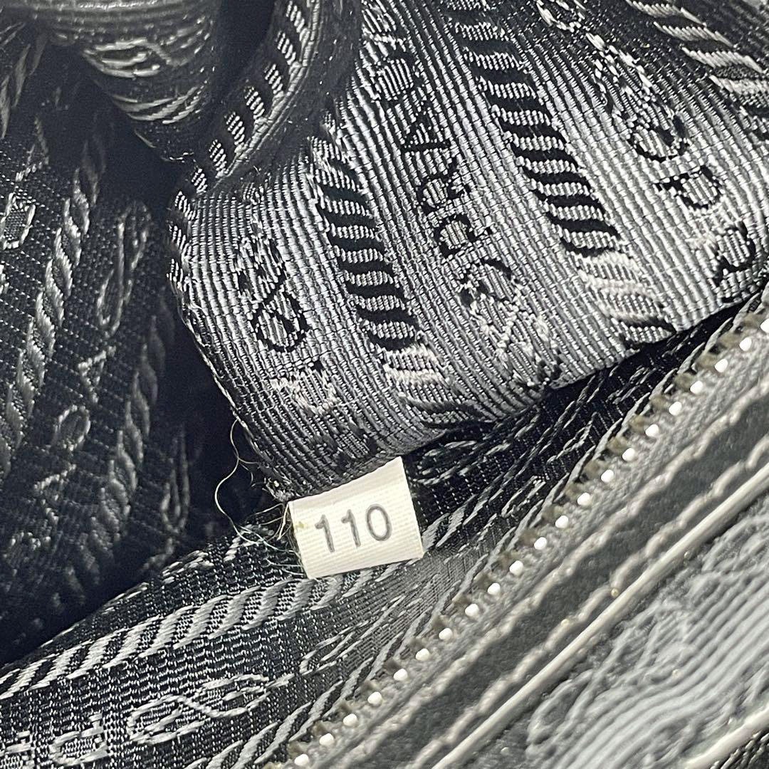 PRADA プラダ リュックサック デイパック ナイロン ファー レザー パンチング 三角ロゴプレート ブラック 1BZ811