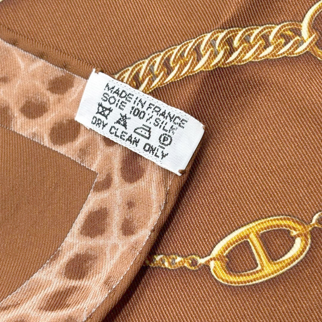 HERMES エルメス スカーフ カレ70 『CHAINES ET GOURMETTES(チェーンとブレスレット)』シェーヌダンクル柄 シルク ブラウン系