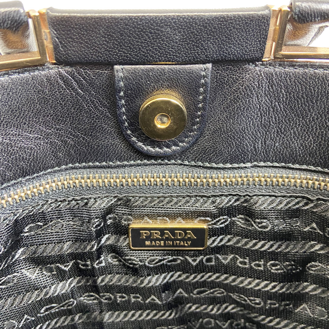 PRADA プラダ ミニトートバッグ ハトメ レザー ブラック ゴールド金具