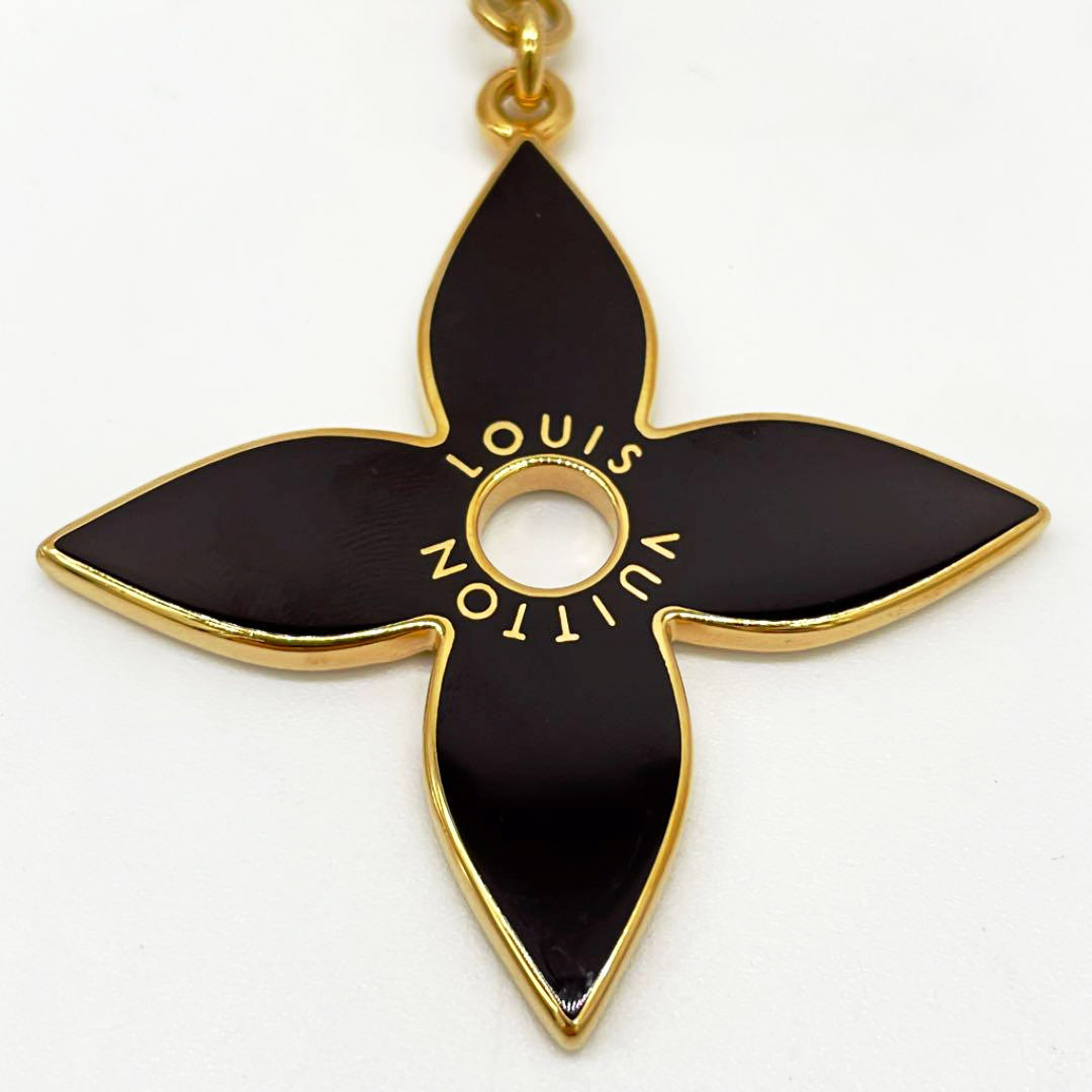 LOUIS VUITTON ルイヴィトン キーリング キーホルダー チャーム ポルトクレ パズル モノグラム フラワー ゴールド ダークブラウン M65218