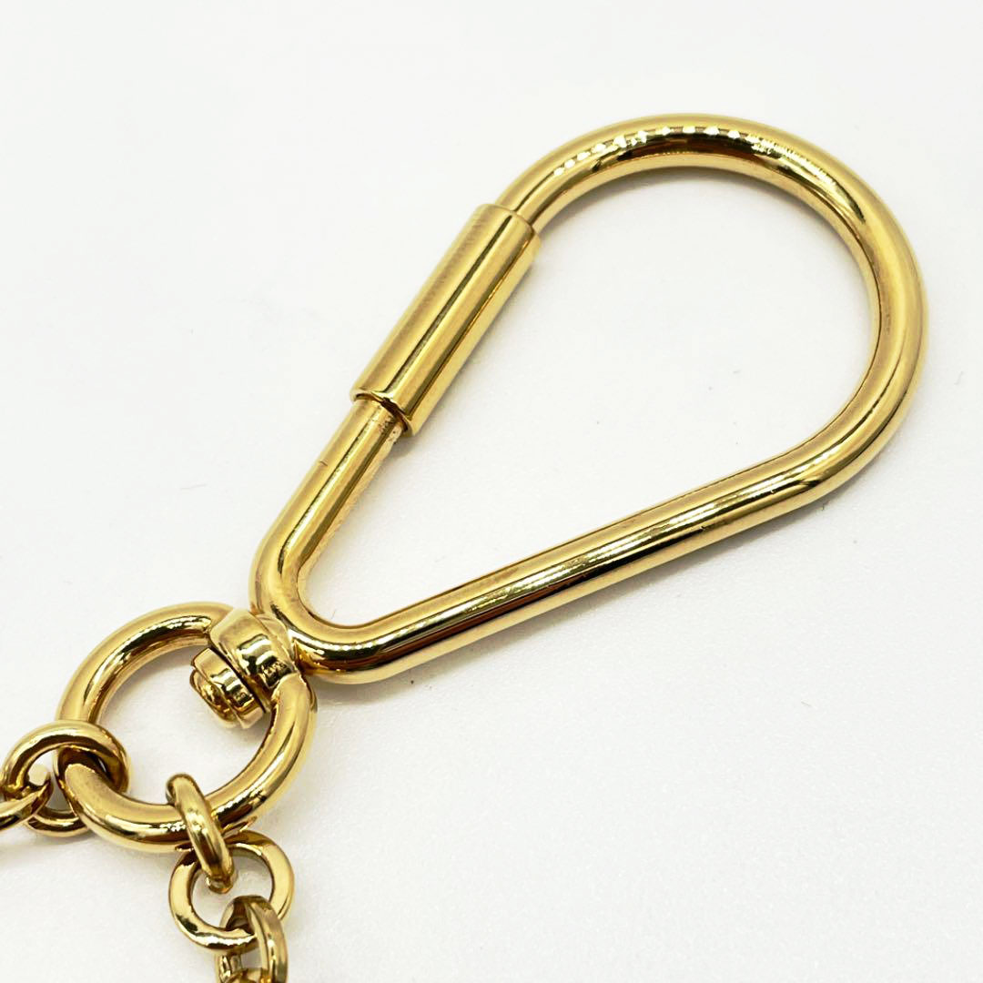 LOUIS VUITTON ルイヴィトン キーリング キーホルダー チャーム ポルトクレ パズル モノグラム フラワー ゴールド ダークブラウン M65218