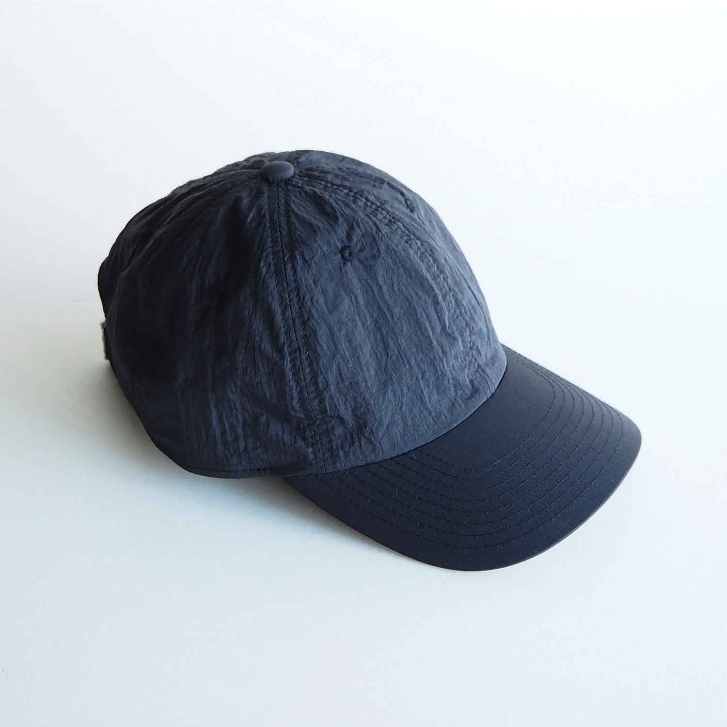 ERA. イーラ SHRINK TAFFETA 6 PANEL CAP シュリンクナイロン6パネルキャップ ブラック