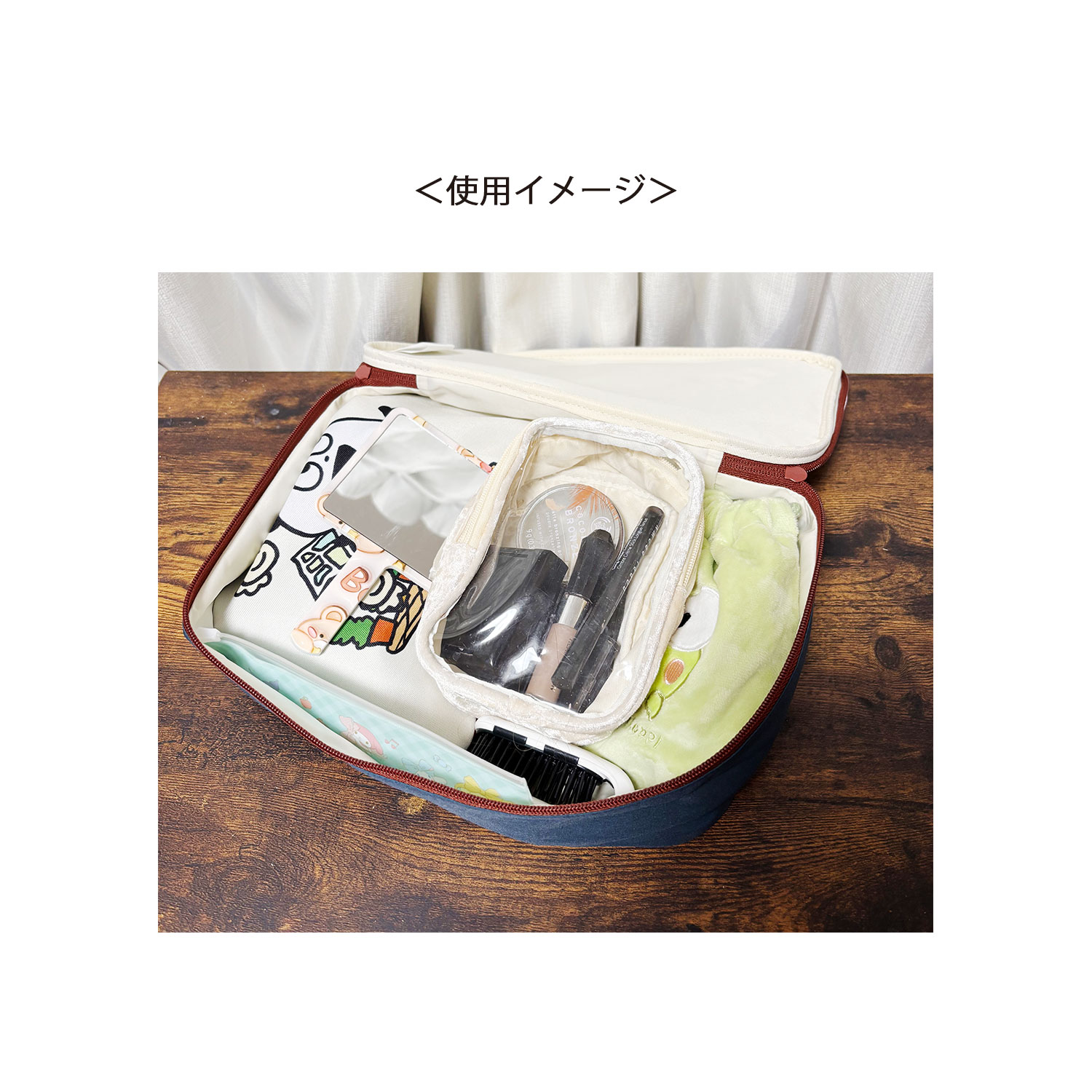 公式] スタジオUG（にしむらゆうじ）収納ポーチM 「旅するごきげん