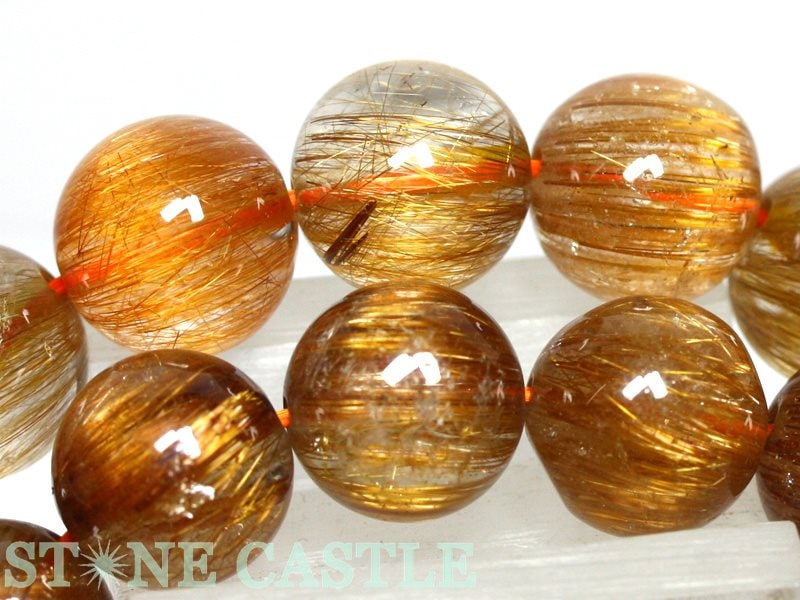 ルチルクォーツ原石 約50ミリ×約23ミリ円柱型