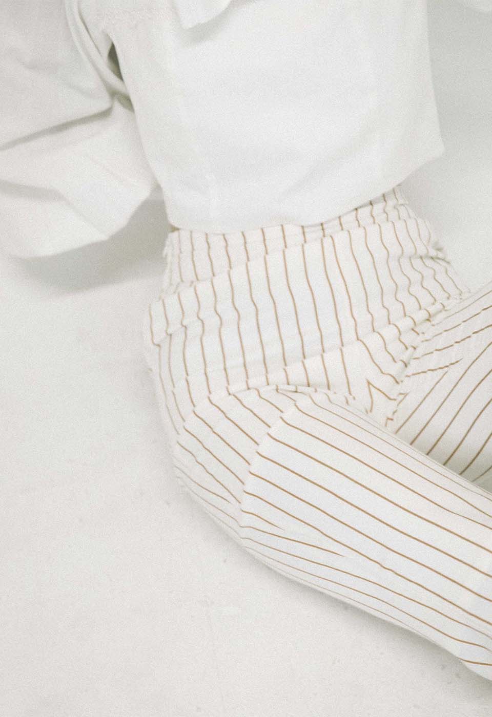 beige striped flared pants