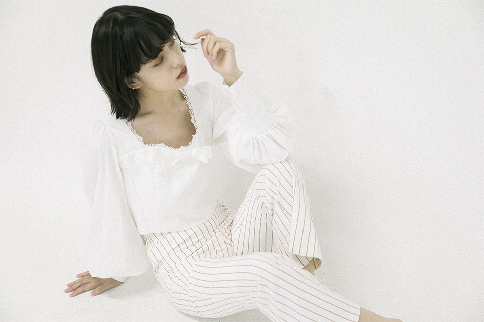 beige striped flared pants