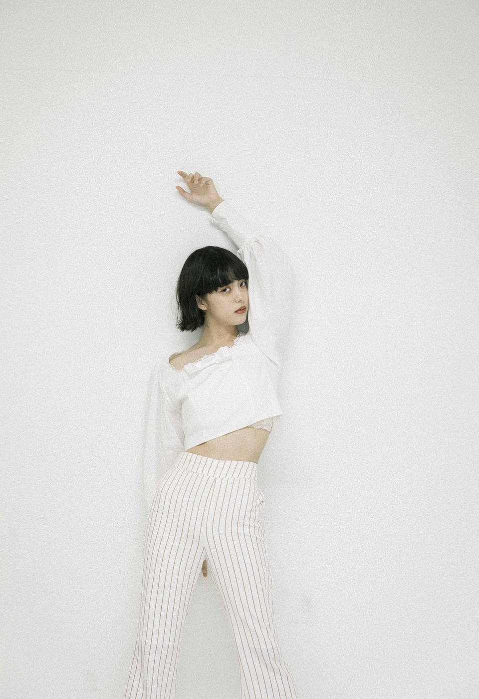 beige striped flared pants