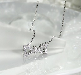 Pt900 ダイヤモンド リバーシブルペンダント【リボン】