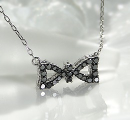 Pt900 ダイヤモンド リバーシブルペンダント【リボン】