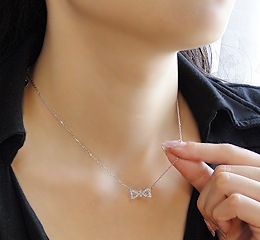 Pt900 ダイヤモンド リバーシブルペンダント【リボン】