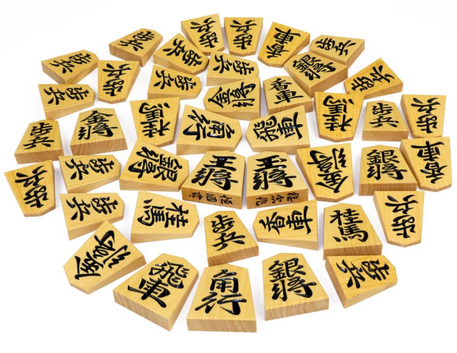 将棋駒 稚念作 御蔵島産本黄楊材 彫駒 恒園書 面取り加工 ※桐平箱付き