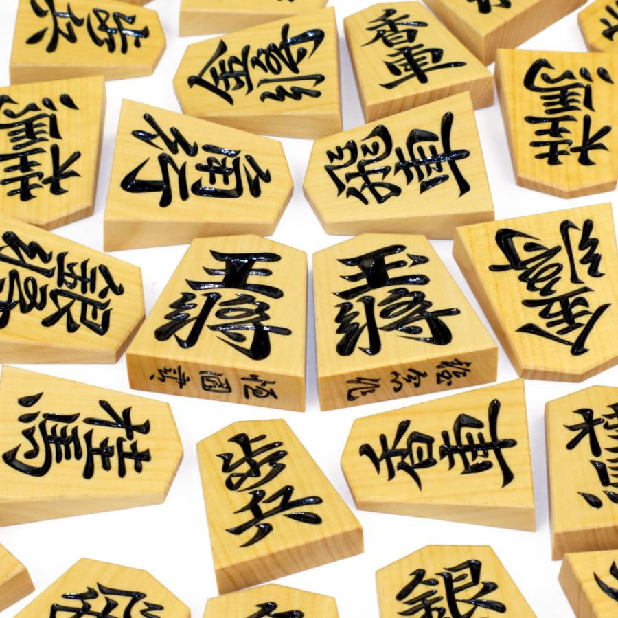 将棋駒 稚念作 御蔵島産本黄楊材 彫駒 恒園書 面取り加工 ※桐平箱付き