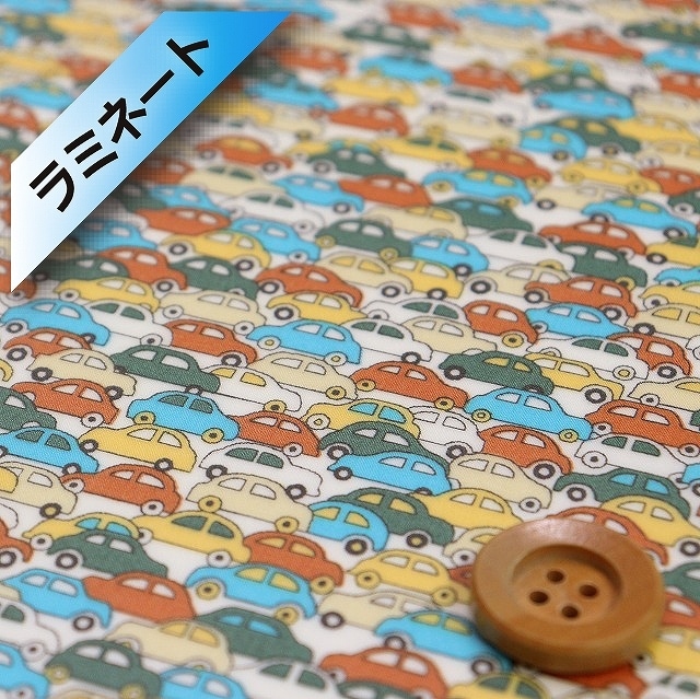 リバティプリント【ピカデリーポプリン/ラミネート加工】（CARS カーズ）グリーン＆オレンジ【09-3639172・AP】