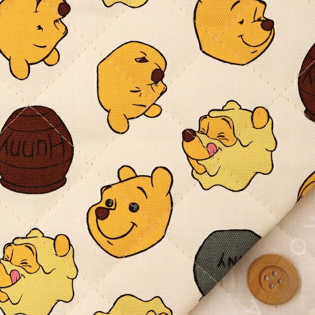 Disney2025 BTSシリーズ　くまのプーさん　フェイス柄／イエロー【半針キルティング生地】