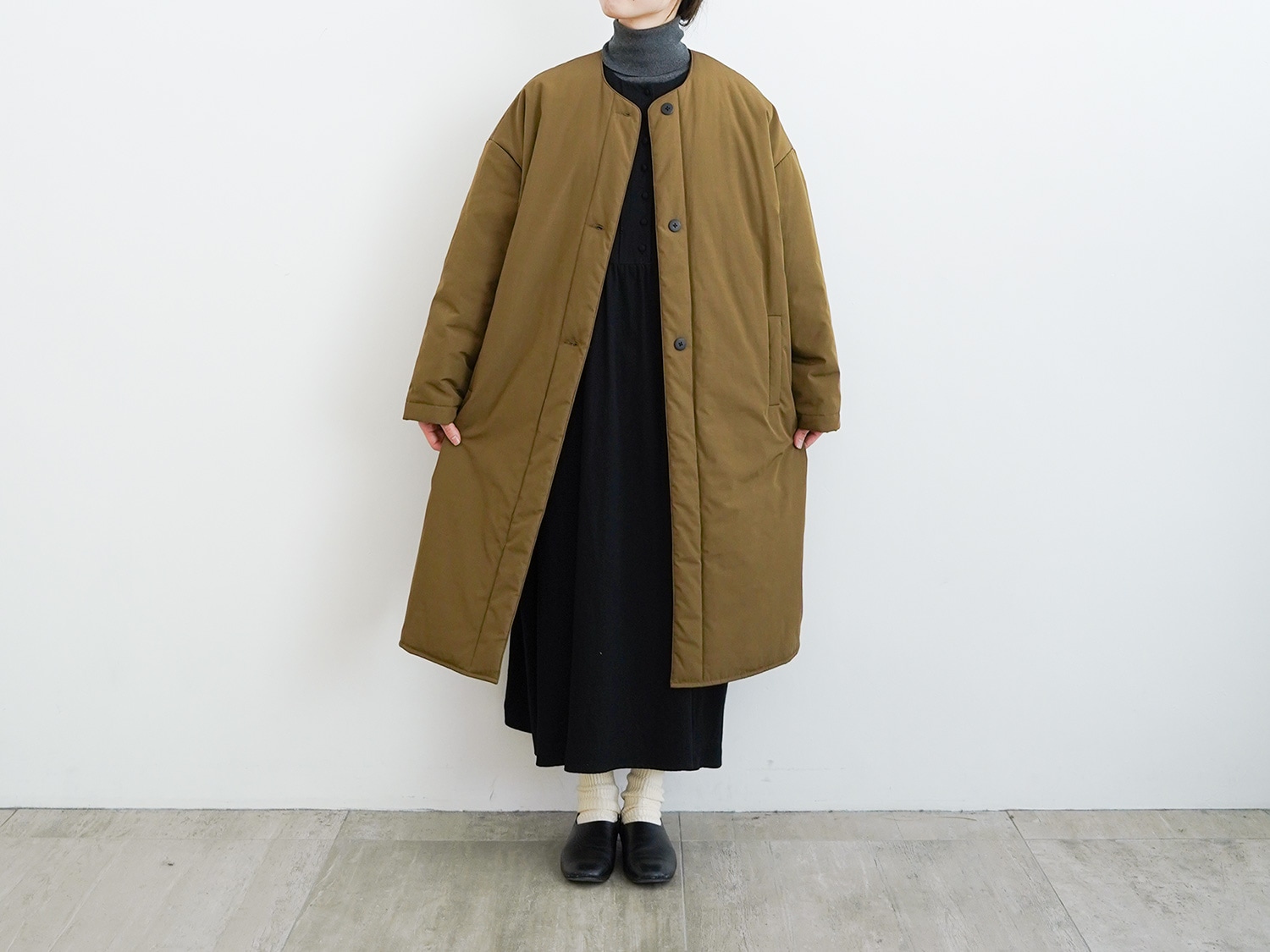 オローネ　フォーカスウォームコート　ノーカラーコート　中綿　黒 オローネ フォーカスウォームコート ノーカラーコート 中綿 黒