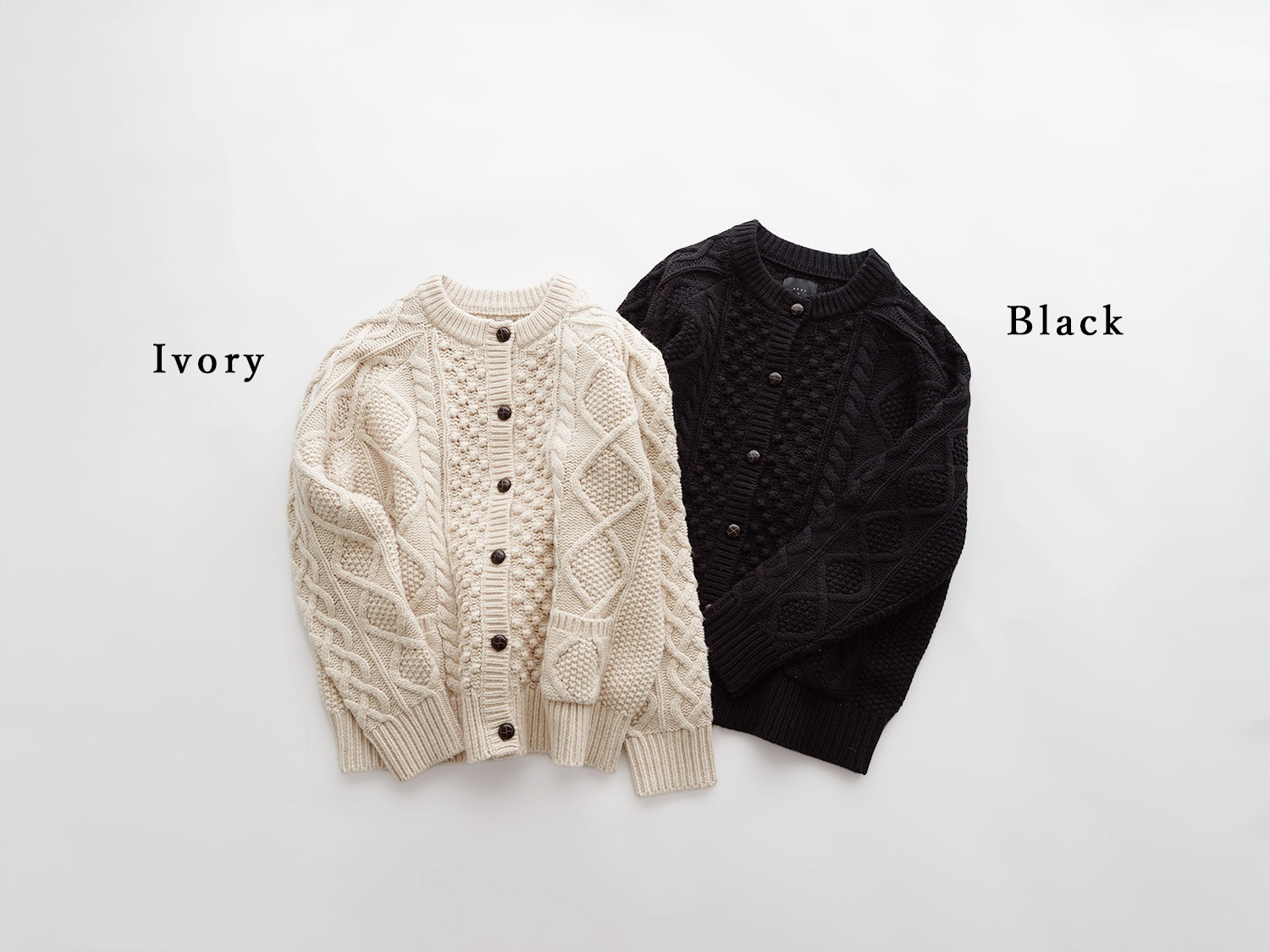 オオカミとフクロウ ケーブルニットカーディガン オオカミとフクロウ ケーブルデザインのブラウンニットカーディガン