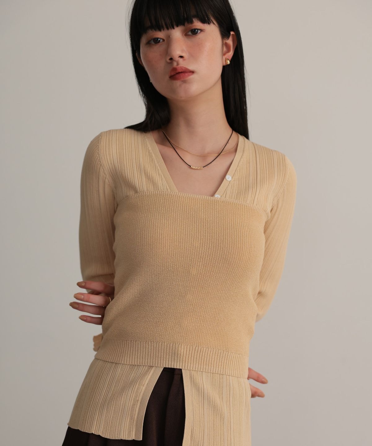 Knit cardigan with bare bustier