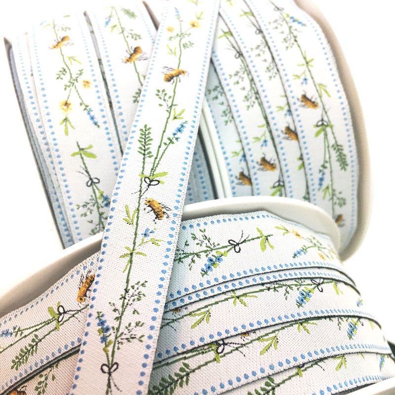 acufactumアクファクトゥム【50cm単位】約幅16mm-縦柄/草原のみつばち柄ジャガードリボン　チロリアンテープ