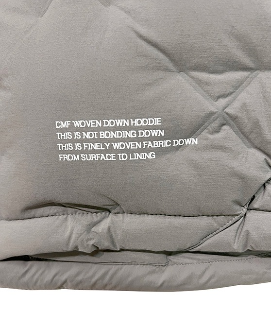 ��SALE 30%OFF��CMF OUTDOOR GARMENT ����ե� �����ȥɥ� �������ȡ�CMF WOVEN DOWN HOODIE�������֥� ������ �ա��ǥ���2��(WOLF GRAY/BLACK)��COMFY 2025FW