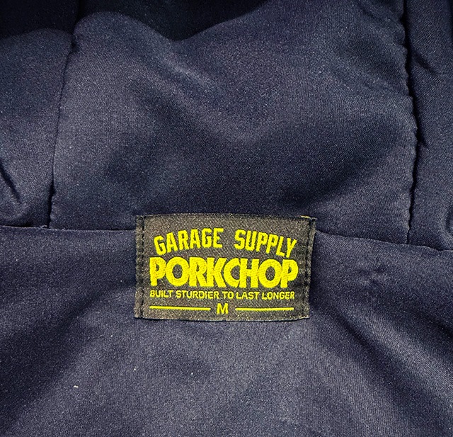 PORKCHOP GARAGE SUPPLY �ݡ�������å� ���졼�� ���ץ饤��BURNING LOGO HOODED JKT���С��˥� ���� �ա��ǥå� ���㥱�åȡ�NAVY �ͥ��ӡ�