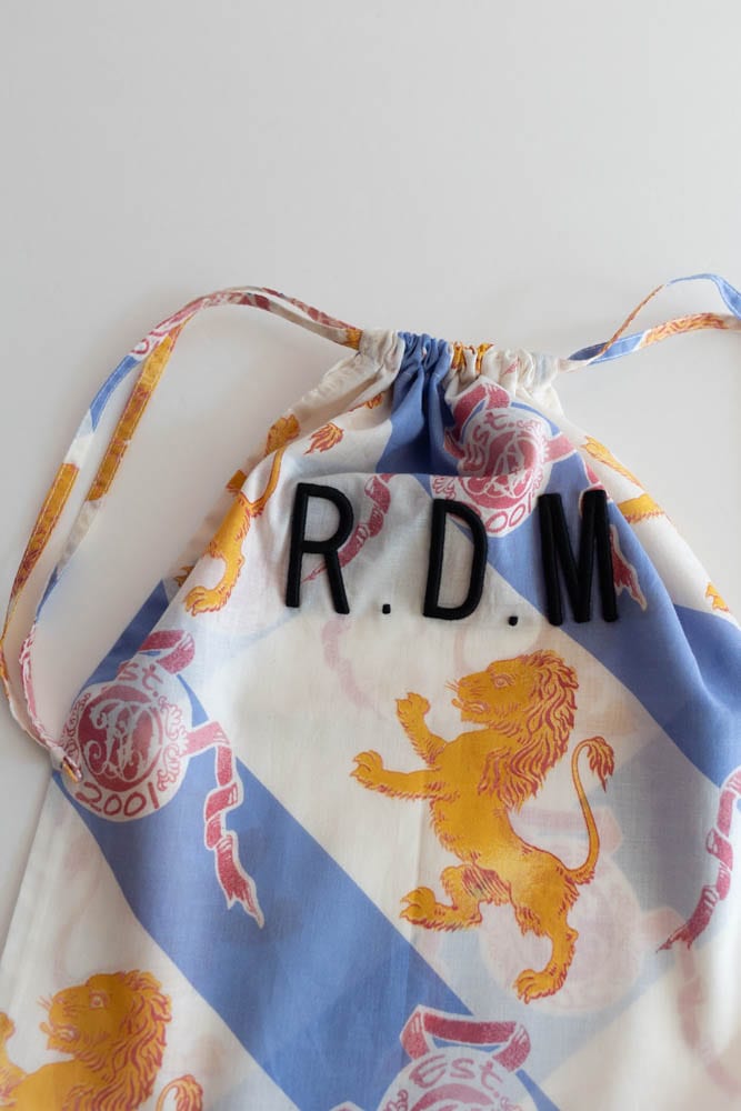 R&D.M.Co- (OLDMAN'S TAILOR) | C.LAWN ROYAL LION DRAWSTRING BAG