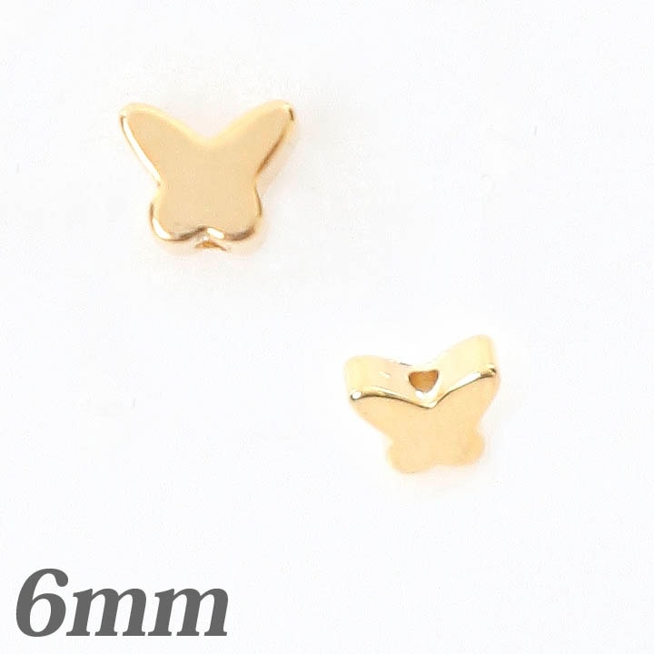 縦穴チャーム　バタフライ　ゴールド6mm 4個入り