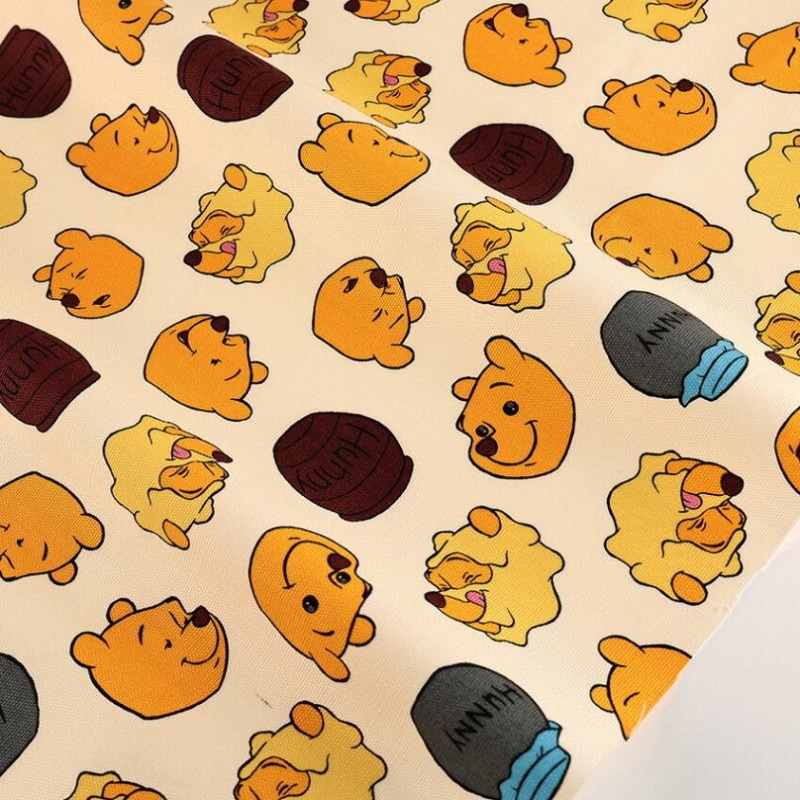 ディズニー くまのプーさん ファニーフェイス柄 オックス 50cm単位