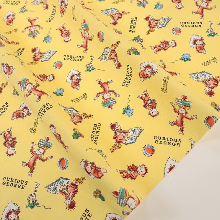 おさるのジョージ ブック柄 オックス 50cm単位