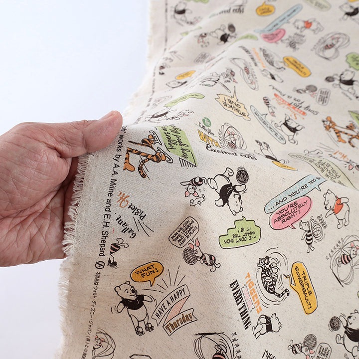 ディズニーくまのプーさんアメコミ 綿麻キャンバス(50cm単位)