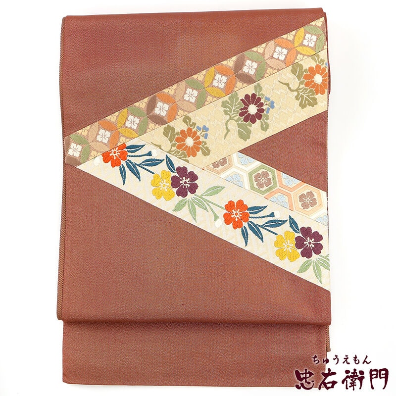 【50%OFF|えびす講セール|期間限定】【中古】 袋帯 リサイクル 正絹 カジュアル セミフォーマル 未仕立て レディース 赤茶 切り嵌め 亀甲花 七宝 花柄 長さ457cm 忠右衛門 即日発送