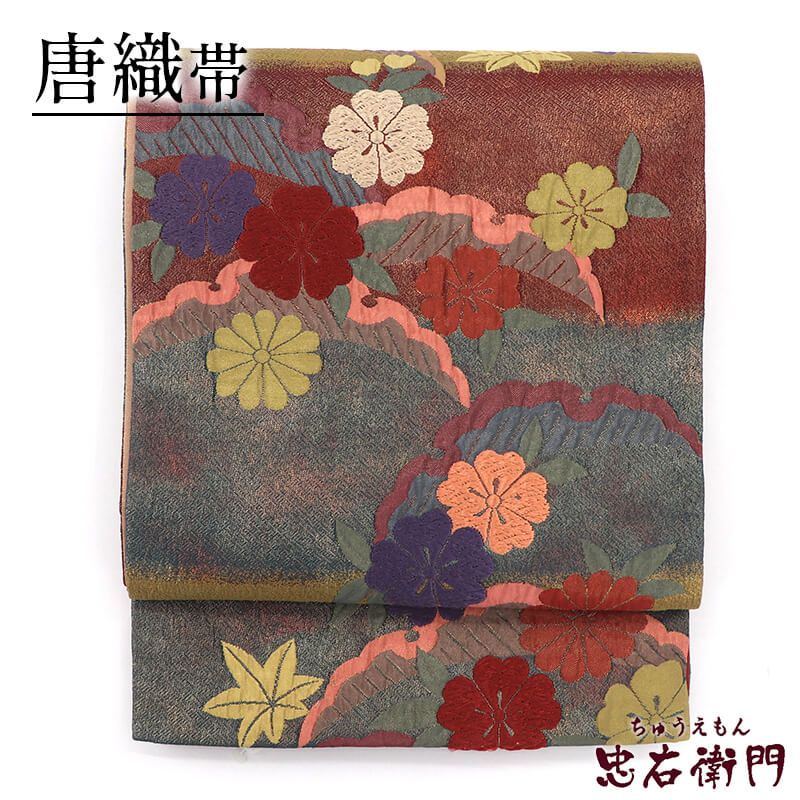 袋帯 唐織 正絹 六通柄 金茶 臙脂 雪輪 花柄 長さ427cm 幅31cm