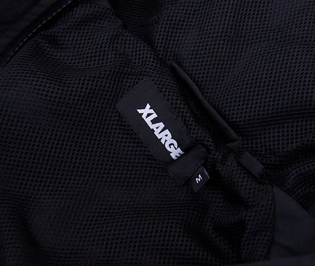 XLARGE �������ȥ�顼�� ��� �饰��� �ա��ǥåɥ��㥱�åȡ�101253021004�ϡ�2025FW��