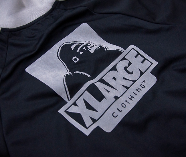 XLARGE �������ȥ�顼�� ��� OG �ȥ�å����㥱�åȡ�101253021005�ϡ�2025FW��