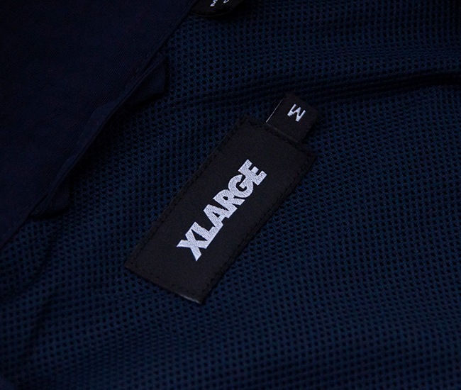 XLARGE �������ȥ�顼�� ��� �ȥ�å��ʥ����󥸥㥱�åȡ�101253021008�ϡ�2025FW��
