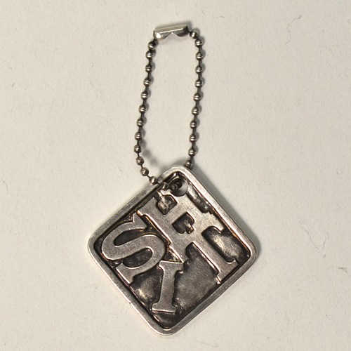 Hotel×Us/Shit Key holder（ホテル×アス キーホルダー）シルバー [a