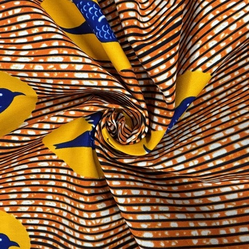 アフリカンプリント 布 生地 50cm単位 AP-13814　飛ぶ鳥 ツバメ 山吹色緑楕円に濃紺鳥 オレンジ色地　アフリカ 布 ブロード カットクロス ハンドメイド パッチワーク エコバッグ 手芸材料 ダンス 舞台 衣装 通園通学に