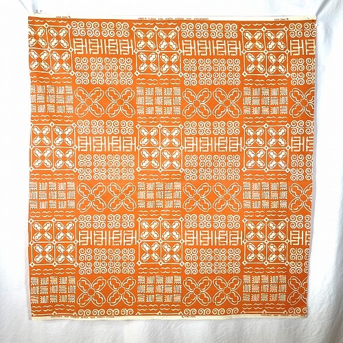 アフリカンプリント生地 0.5m単位 AP-12981　ハワイアンなアディンクラ 淡いオレンジ