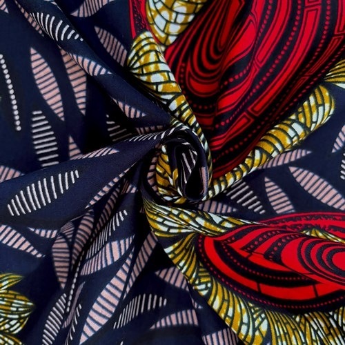 アフリカンプリント 布 生地 50cm単位 AP-13522  赤い渦巻きひまわり 黒x濃紺地  アフリカ 布 ブロード カットクロス ハンドメイド パッチワーク エコバッグ 手芸材料 ダンス 舞台 衣装 通園通学に