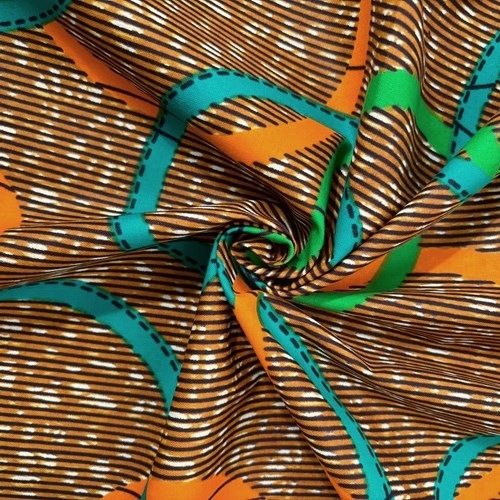 アフリカンプリント 布 生地 50cm単位 AP-13285  変則オリンピア 泡 茶色地 ブルーグリーン キミドリ オレンジ　　  アフリカ 布 ブロード カットクロス ハンドメイド パッチワーク エコバッグ 手芸材料 ダンス 舞台 衣装 通園通学に