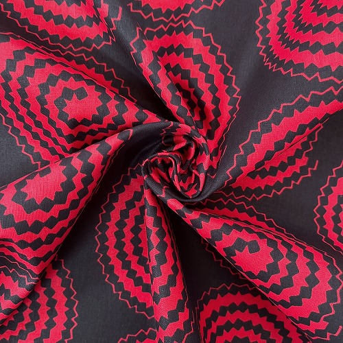 アフリカンプリント 布 生地 50cm単位 AP-13274 ぐるぐる渦巻き 赤x黒