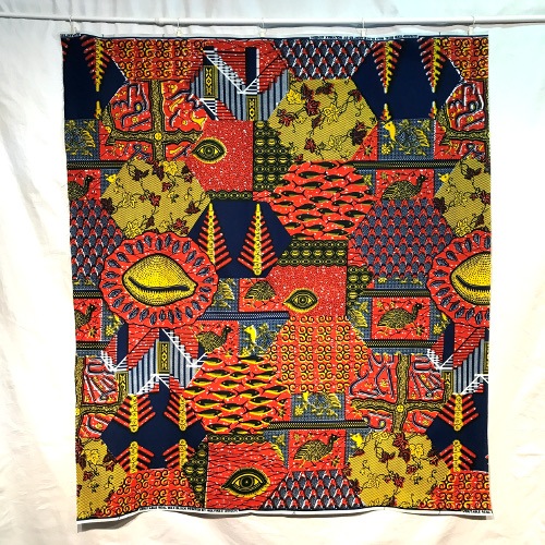 ＜sale＞アフリカンプリント生地 0.5m(50cm)単位 AP-13022　神の目 子安貝 魚 オレンジ濃紺