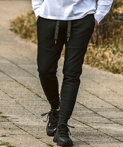 パイピングロゴワイドスピンドルジョガーパンツ ブラック 1PIU1UGUALE3 RELAX ウノピゥウノウグァーレトレ リラックス