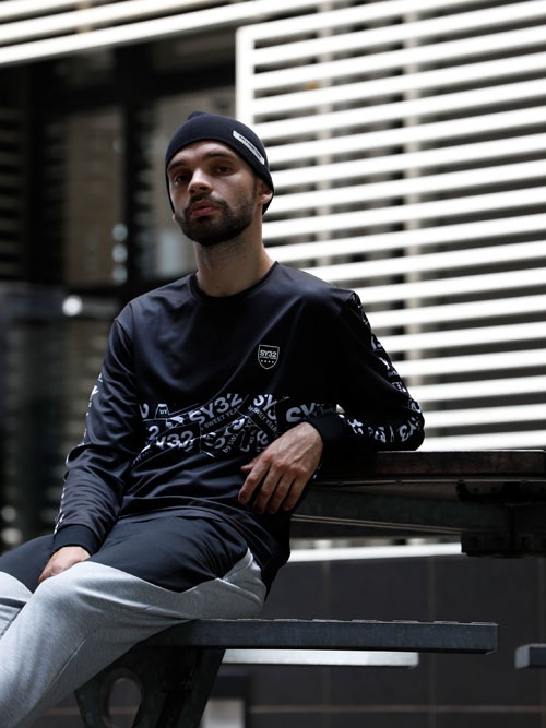 SY32 by SWEET YEARSEXCHANGE L/S TEEBLACK