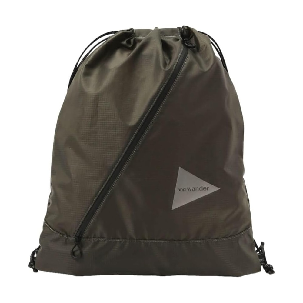 [当日出荷可] and wander 147 crispy rip drawstring bag khaki [アンドワンダー]