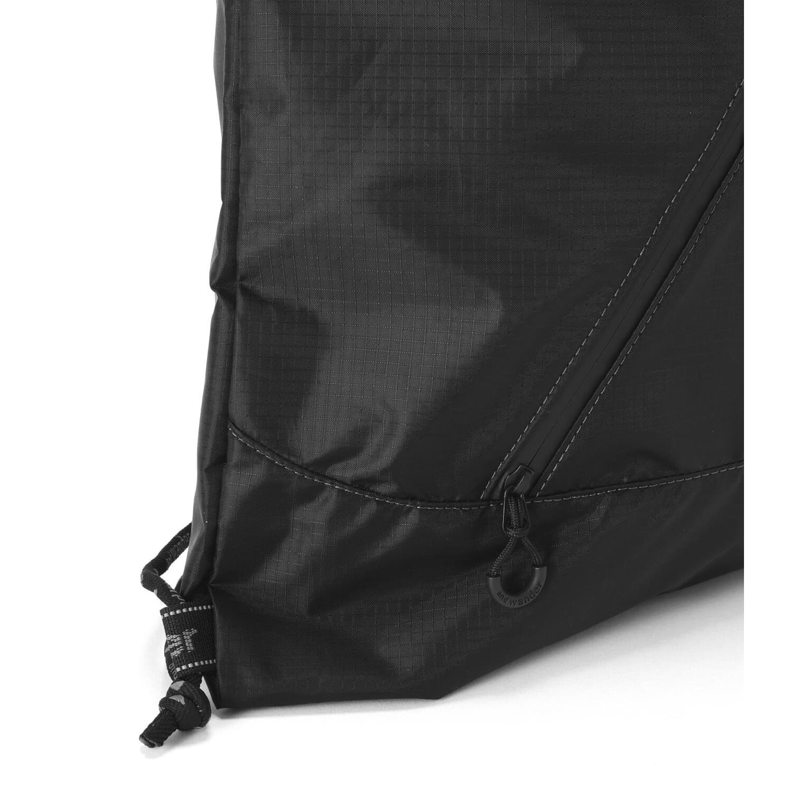 and wander 147 crispy rip drawstring bag black [アンドワンダー]