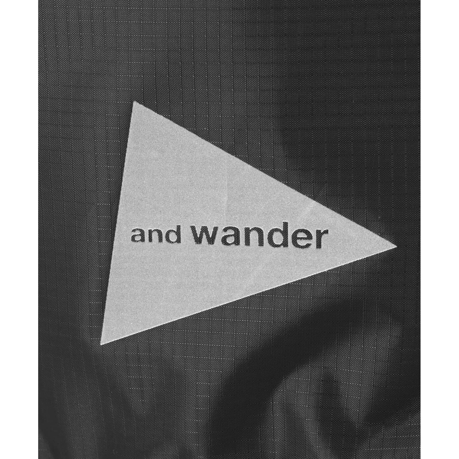 and wander 147 crispy rip drawstring bag black [アンドワンダー]