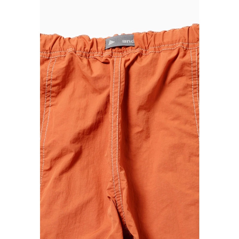 [当日出荷可][10%OFF] and wander crinkled nylon pants orange [アンドワンダー]