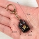 招き猫キーホルダー　黒　鈴タイプ　お金を招く右手上げ　金運上昇の小さな縁起物　バッグや財布にも