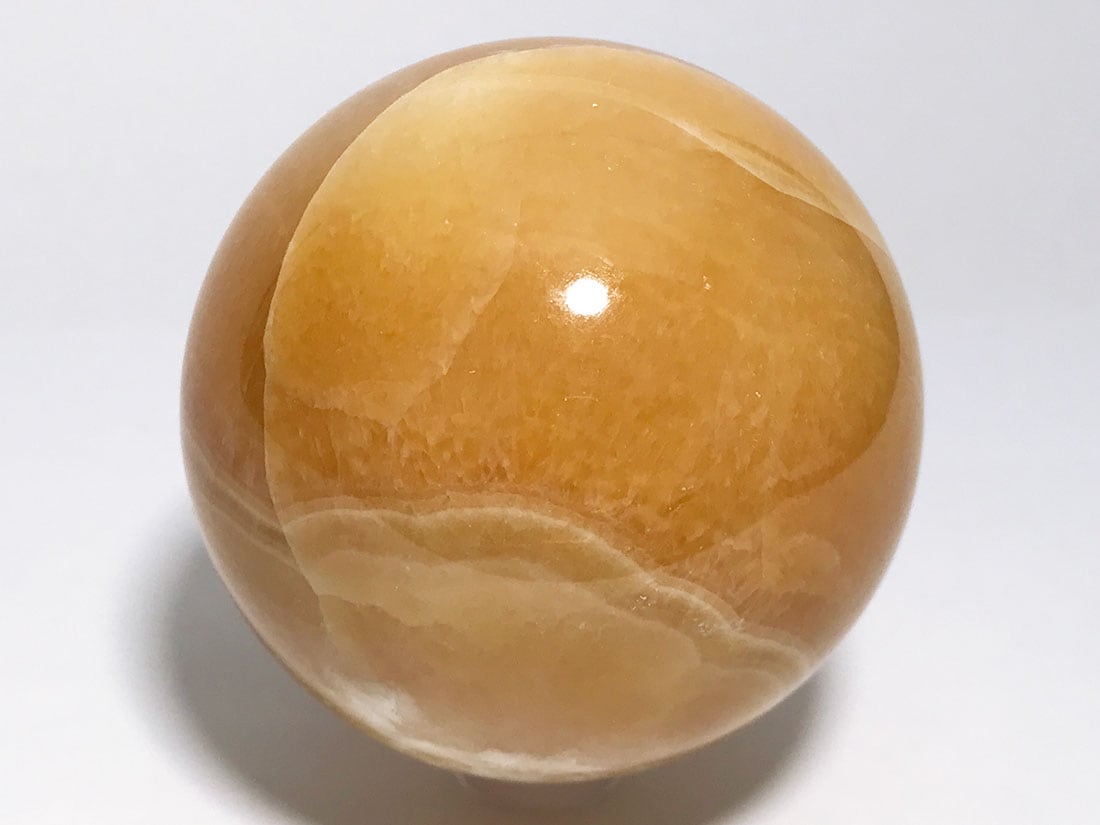 天然石　オレンジカルサイト　丸玉　No.1 メキシコ産オレンジカルサイト57mm丸玉
