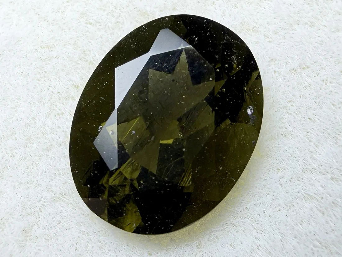 【鑑別書付き】チェコ産 モルダバイト 1.458ct ルース / Moldavite